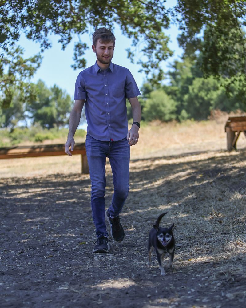 Man walking a dog in Our San Francisco Bay Area Service Area_