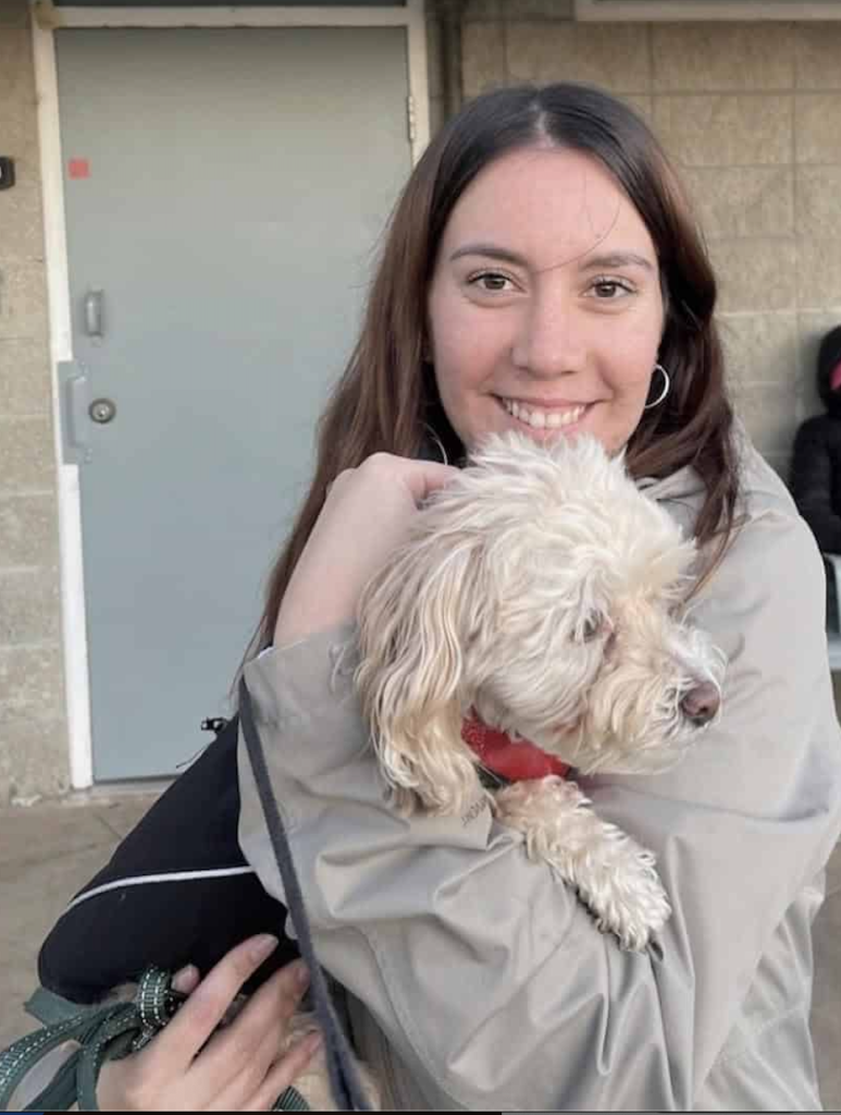 Anna holding her dog, Tanner